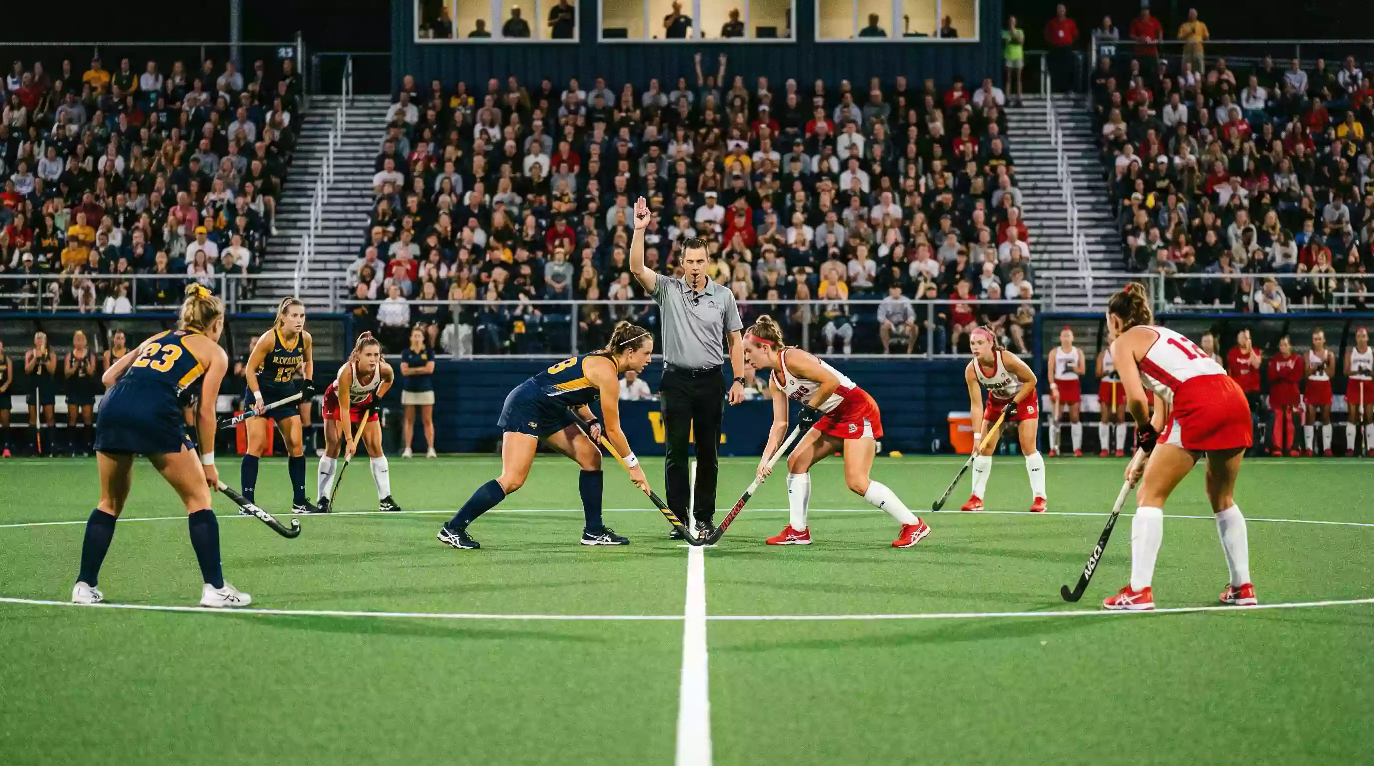 Hockeyteams bij de aftrap van een wedstrijd
